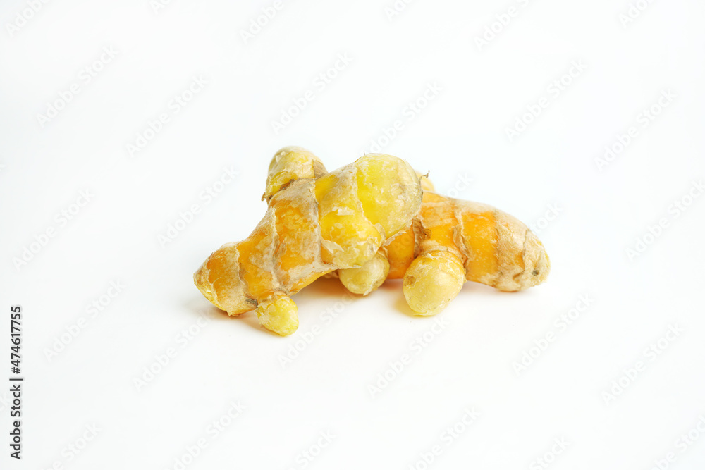 Fresh turmeric on white background,raw material for cooking. Close up. Fresh turmeric on white background,raw material for cooking. Close up.
