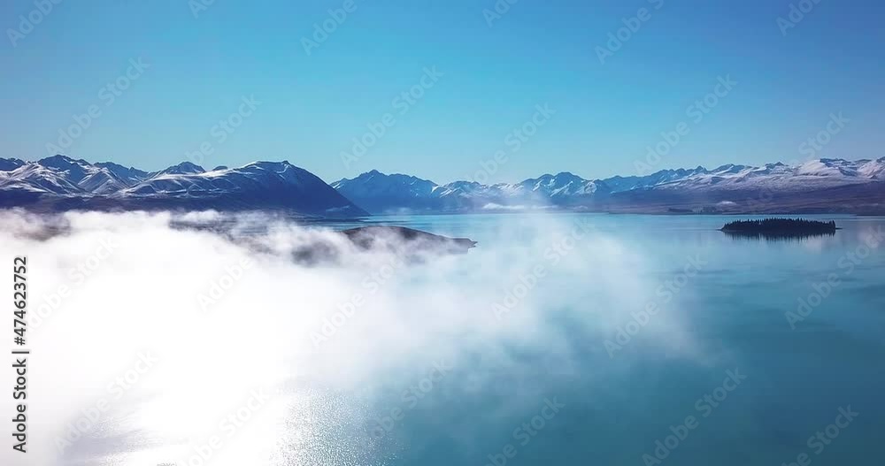 Slow Motion 60 FPS Aerial View of Lake Tekapo in New Zealand - Dolly Shot Slow Motion 60 FPS Aerial View of Lake Tekapo in New Zealand - Dolly Shot