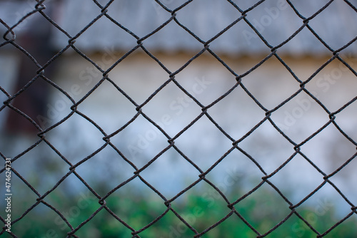 Metal mesh chain-link close-up. Background and texture.
