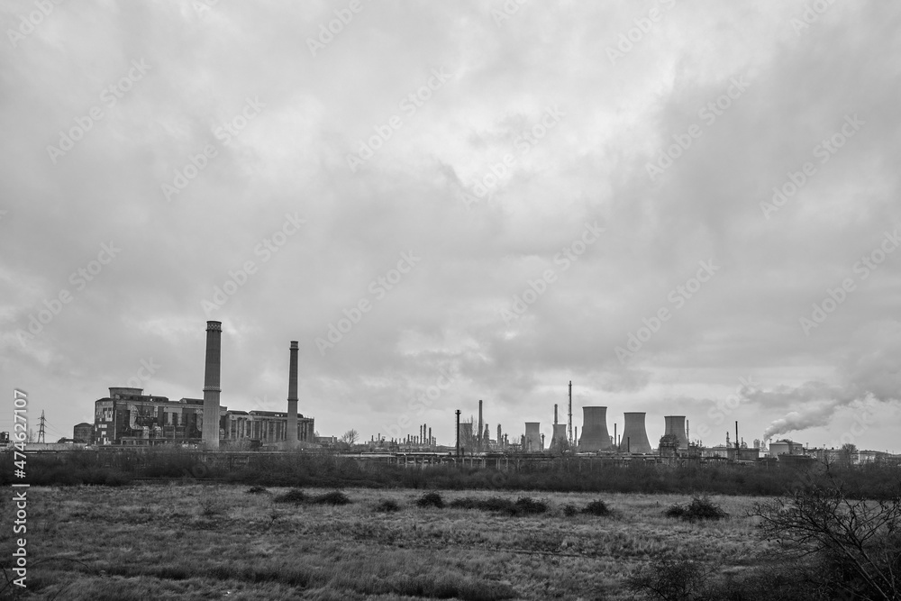 industrial landscape with a refinery, polluting industry. Industrial ruins.