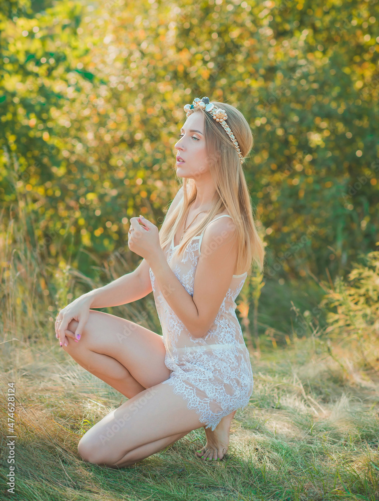 Pretty romantic woman in Boho style. Concept of fashion trends, women's beauty Pretty romantic woman in Boho style. Concept of fashion trends, women's beauty
