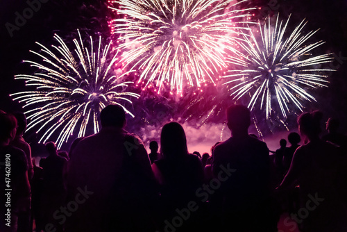 Crowd watching fireworks and celebrating new year eve © NDABCREATIVITY