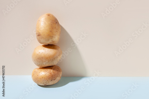 Potato tubers in tower. The concept of vegetables
