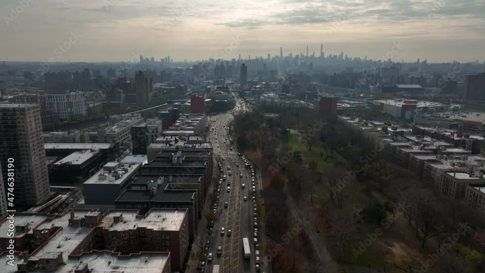 flying backwards over Grand Concourse in the Bronx away from NYC skyline