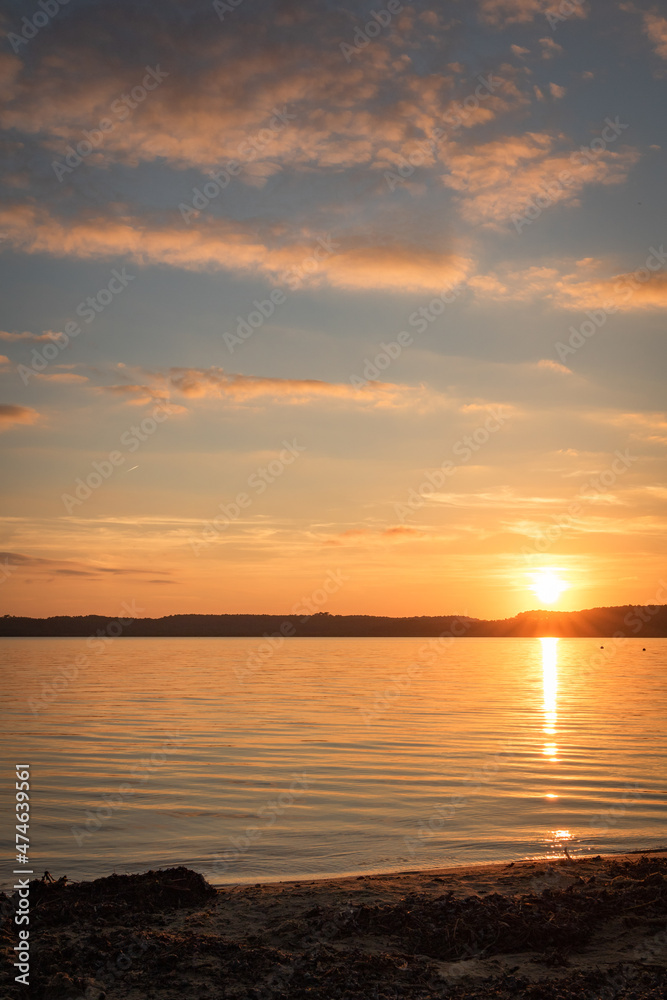 beautiful sunset scenery above the lake in south west of france, les landes