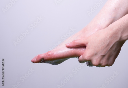Washing your feet. Foam feet. Wash your feet with soap