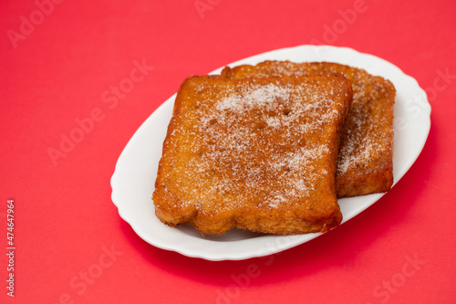 typical portuguese Christmas dessert fried bread with cinnamon photo