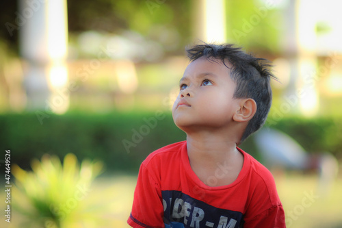Portrait of cute boy or Asian kids Little child smile at outdoor park concept.