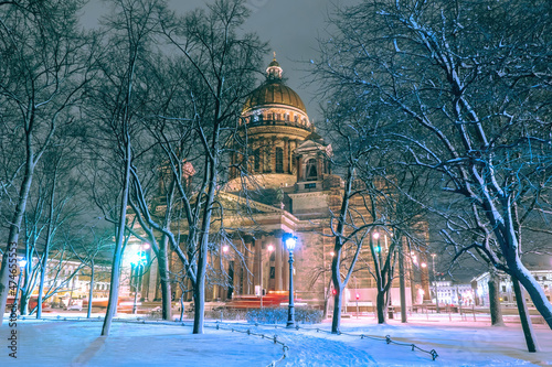 Christmas night Saint Petersburg. Russia Winter. Isakievskaya Square in snow. St. Isaac's Cathedral at Christmas Eve. Christmas holidays in Saint Petersburg. Petersburg new year. Travel Russia