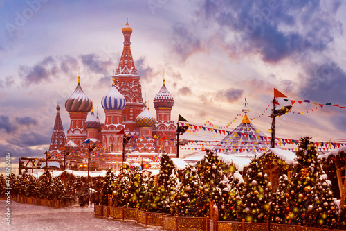 Moscow winter. Russia about Christmas holidays. Red Square Christmas market. St. Basil's Cathedral in snow. New Year's decorations at walls of Kremlin. Christmas trip to Russia. Cathedrals of Russia