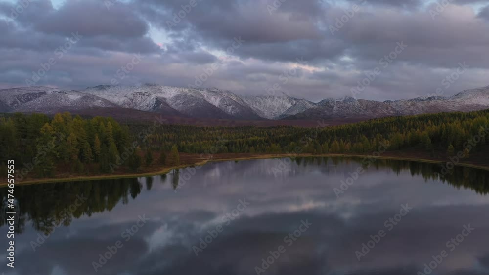 Aerial View. Flying over the beautiful lake near mountains. Aerial camera shot. Landscape panorama. Altai, Siberia. 4k. Aerial View. Flying over the beautiful lake near mountains. Aerial camera shot. Landscape panorama. Altai, Siberia. 4k.