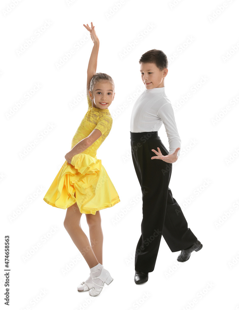Obraz premium Beautifully dressed couple of kids dancing on white background
