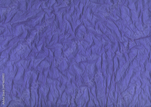 Crumpled paper. Beautiful color of the year 2022 background Very Peri.