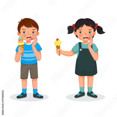 Kids toothache when eating cold ice cream touching their cheeks and feel aching