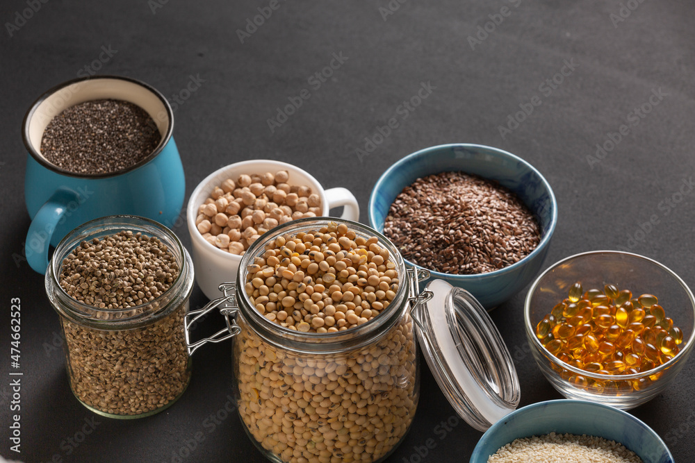 Source of vitamin E and nutrients in bowls on the table, copy space Source of vitamin E and nutrients in bowls on the table, copy space