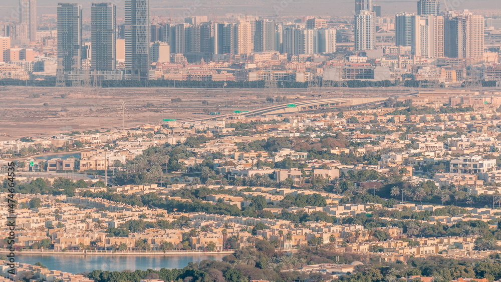 Aerial view of Jumeirah Village Circle district timelapse