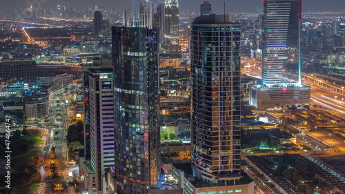 Aerial view of media city and internet city night timelapse from Dubai marina. © neiezhmakov