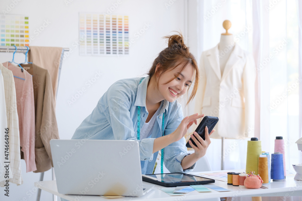 Fashion designer working in studio Fashion designer working in studio
