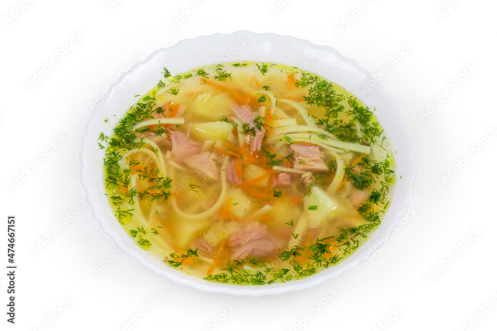 Chicken noodle soup in bowl on a white background Chicken noodle soup in bowl on a white background