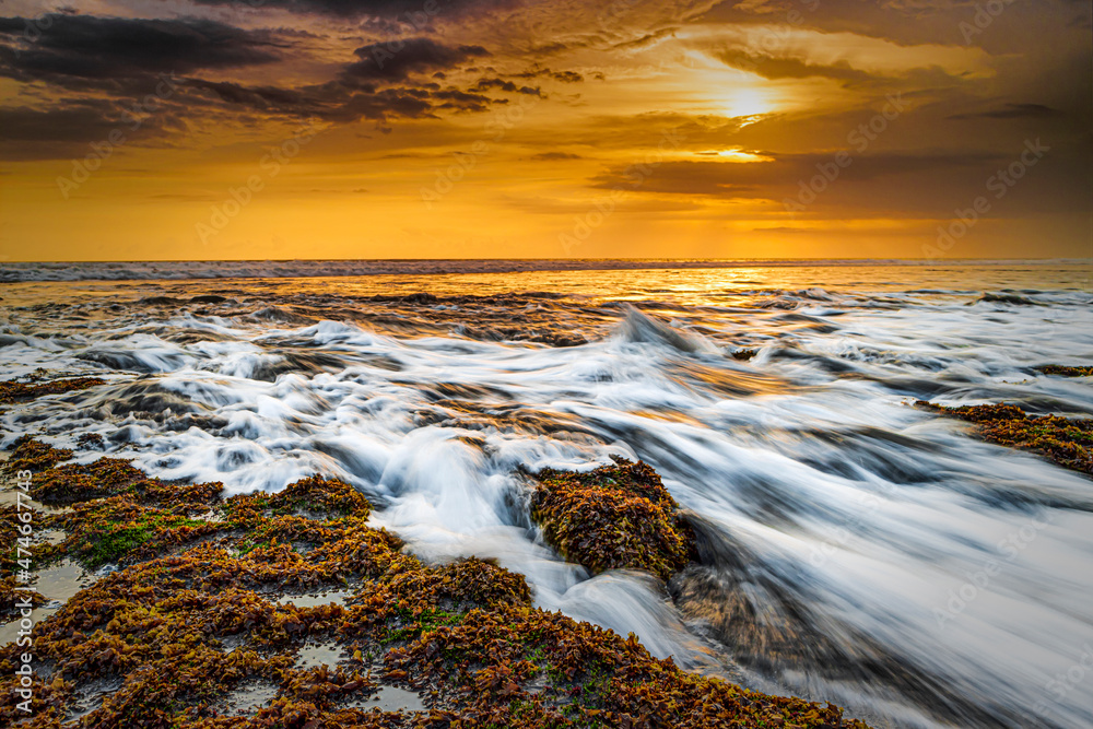 Fototapeta premium Sunset at Pasut Beach, Bali