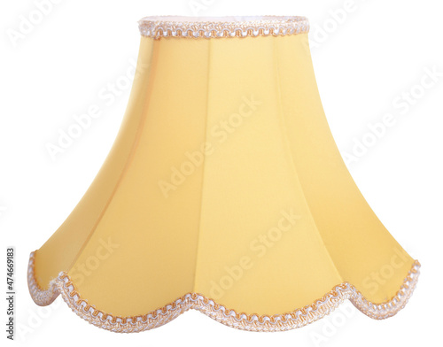 classic cut corner bell shaped yellow tapered lampshade on a white background isolated close up shot photo