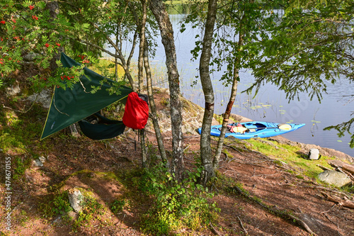 Fototapeta Naklejka Na Ścianę i Meble -  Camp on lake shore in Scandinavia, wild vivac camping in Norway