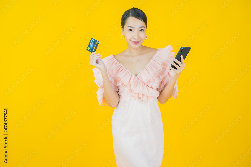 Portrait beautiful young asian woman smile with credit card Portrait beautiful young asian woman smile with credit card