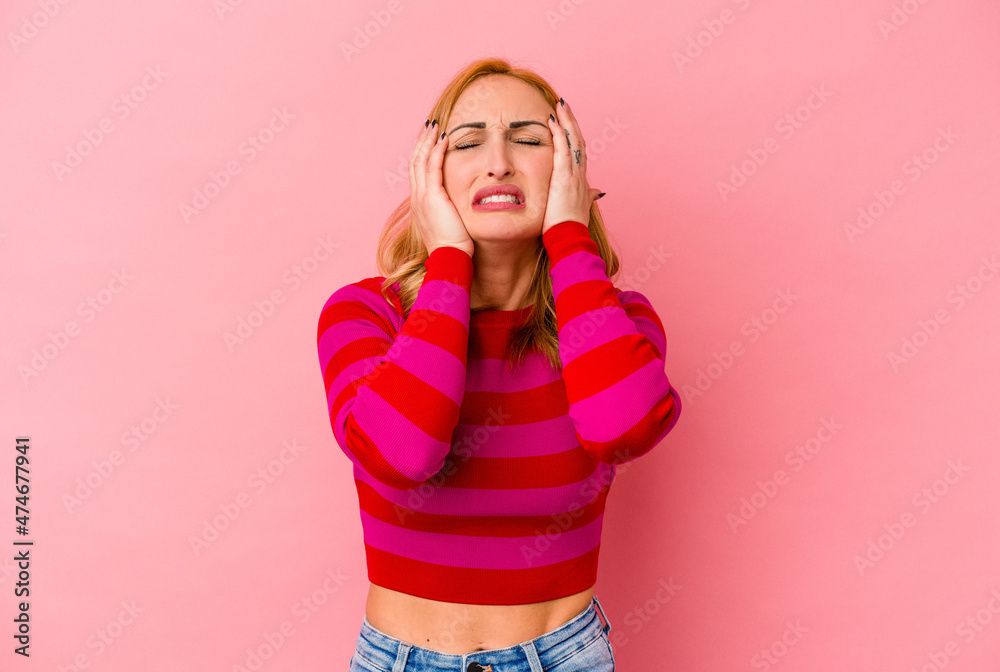 Young caucasian woman isolated on pink background whining and crying disconsolately. Young caucasian woman isolated on pink background whining and crying disconsolately.