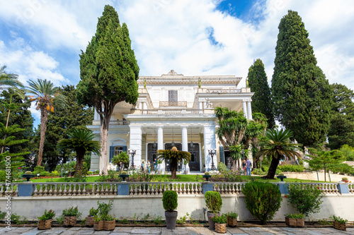 Achilleion palace, Corfu, Greece - October 24, 2021: Front view of the Achillion Palace on the island of Corfu. photo