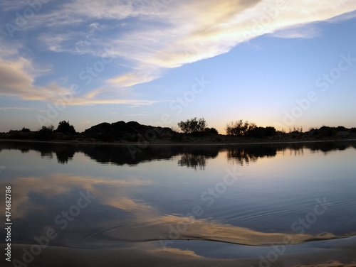 Stunning sunset over the shallow waters of the Elafonisi lagoon  deer island  on the southwest tip of Crete  Chania region  Greece.