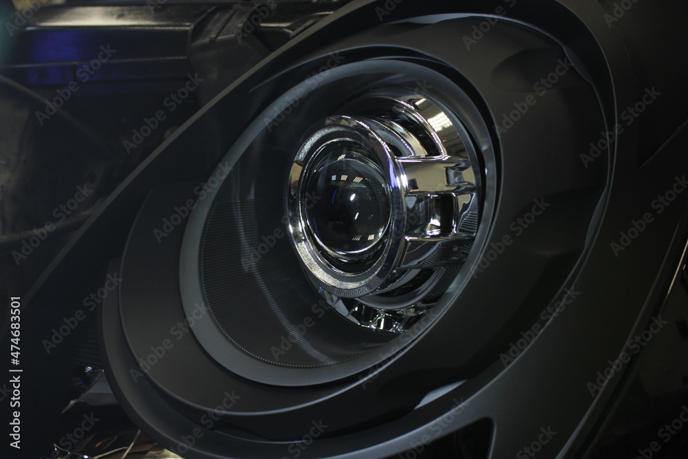 Installing the headlight on the car. Repair of car headlights. Tuning and restoration of automotive optics. Installation of the LED lens in the headlight housing. Installing the headlight on the car. Repair of car headlights. Tuning and restoration of automotive optics. Installation of the LED lens in the headlight housing.