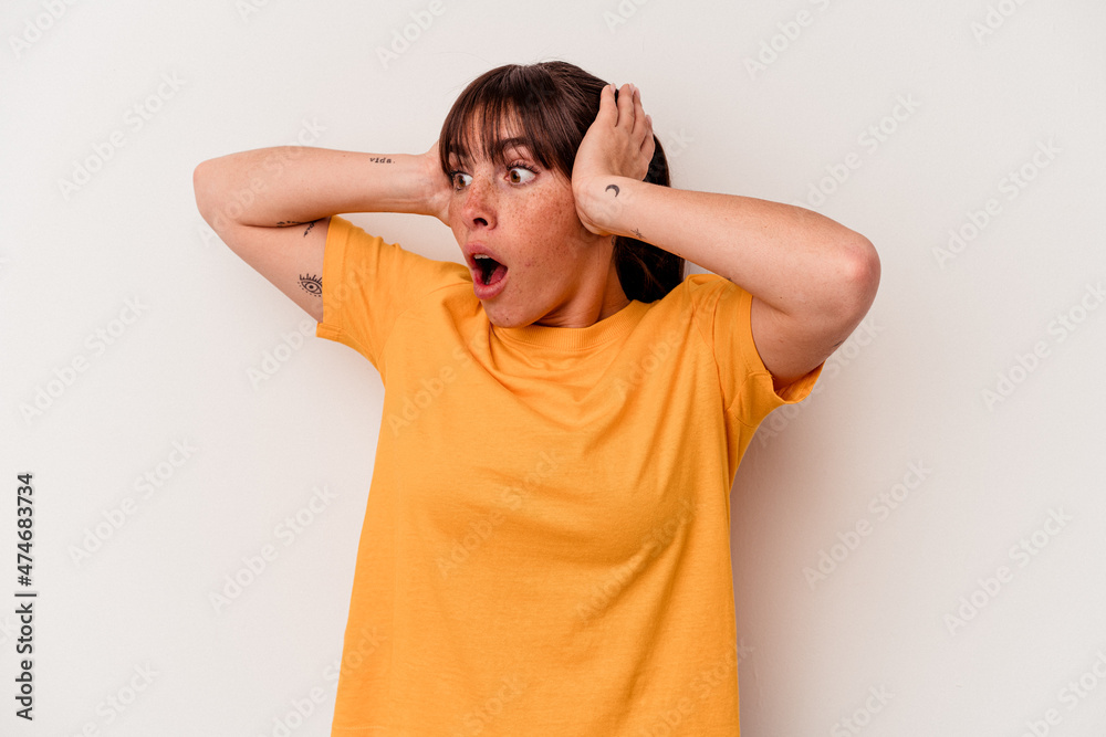 Young Argentinian woman isolated on white background screaming, very excited, passionate, satisfied with something. Young Argentinian woman isolated on white background screaming, very excited, passionate, satisfied with something.