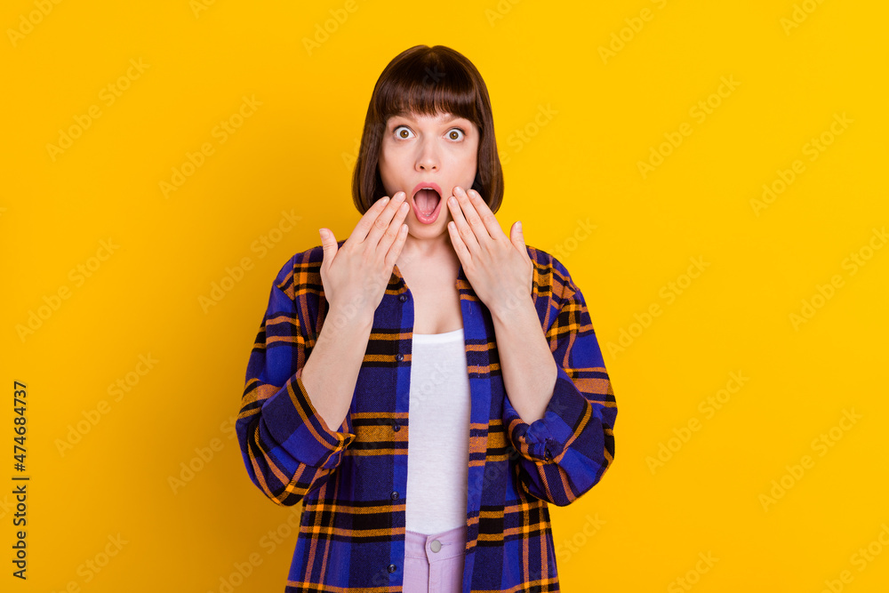 Portrait of attractive amazed girl sudden news reaction stupor srating eyes no way isolated over bright yellow color background Portrait of attractive amazed girl sudden news reaction stupor srating eyes no way isolated over bright yellow color background