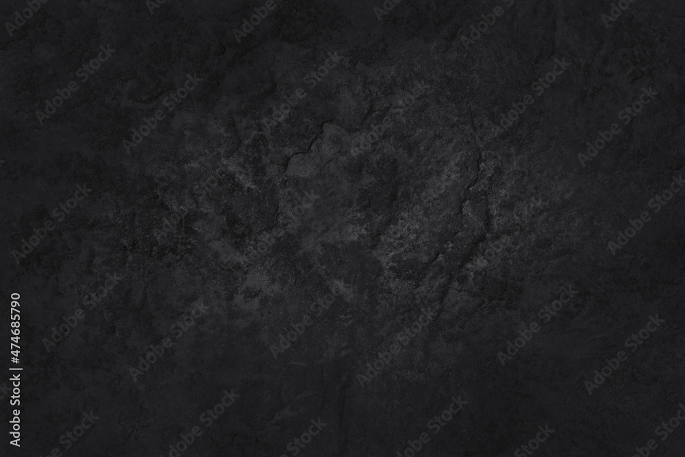 Fototapeta premium Dark gray black slate stone wall texture background in natural pattern for decorative interior and exterior.