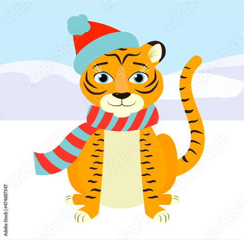 Fototapeta Naklejka Na Ścianę i Meble -  An orange tiger in the winter