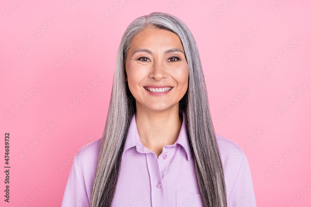 Portrait of attractive cheerful glad gray-haired woman wearing formal office shirt isolated over pink pastel color background - obrazy, fototapety, plakaty 