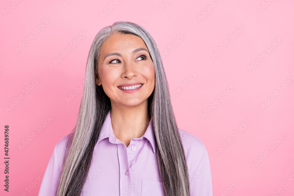 Portrait of attractive cheerful curious gray-haired woman thinking copy space isolated over pink pastel color background Portrait of attractive cheerful curious gray-haired woman thinking copy space isolated over pink pastel color background