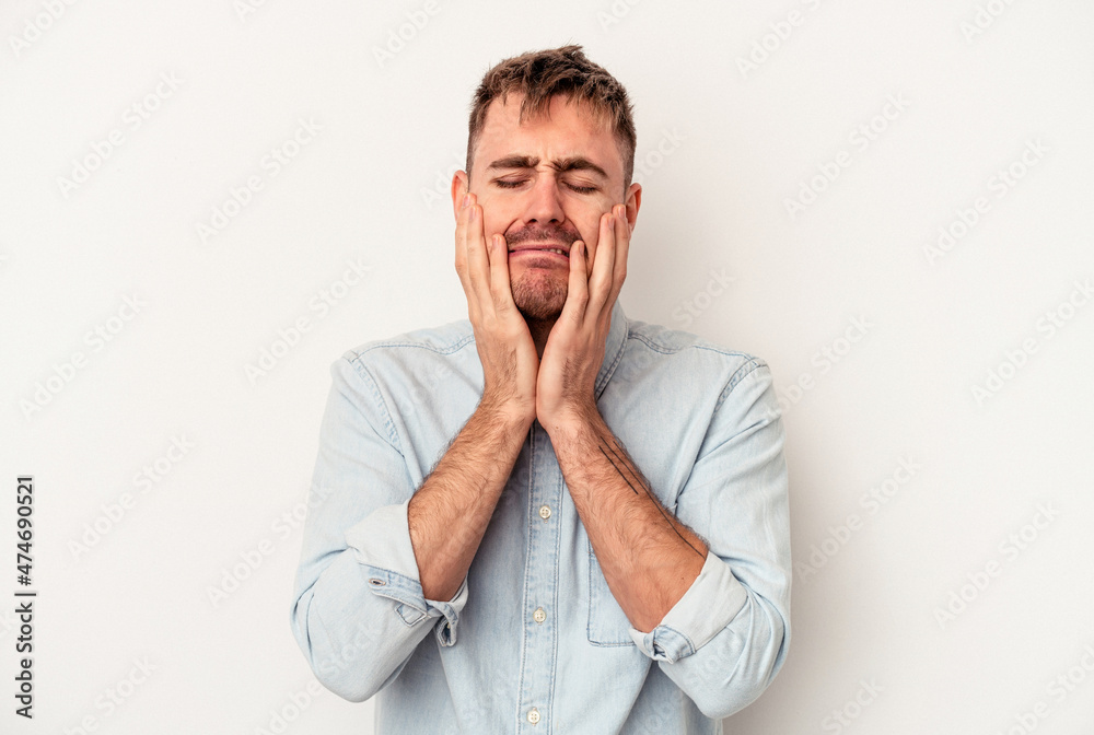 Young caucasian man isolated on white background showing number two with fingers. Young caucasian man isolated on white background showing number two with fingers.