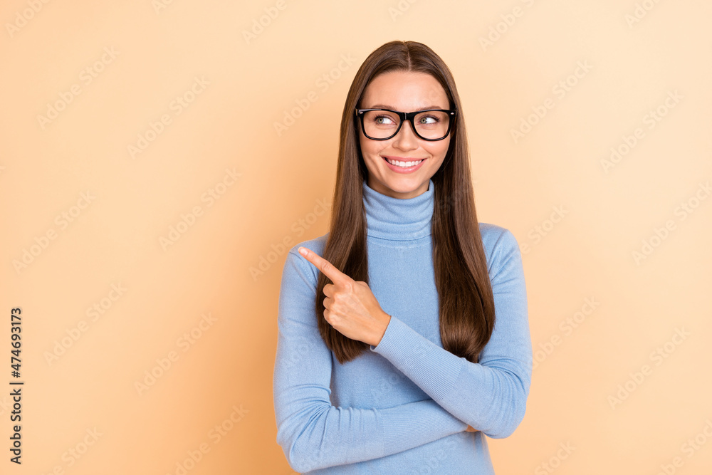 Obraz premium Photo of hr brunette young lady index promo wear spectacles blue turtleneck isolated on beige color background