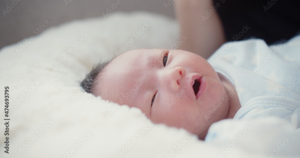 close up portrait face of cute lovely little newborn baby infant sleeping at home, Happiness Newborn Baby at Comfortable Home in Day Lighting Indoors
close up portrait face of cute lovely little newborn baby infant sleeping at home, Happiness Newborn Baby at Comfortable Home in Day Lighting Indoors