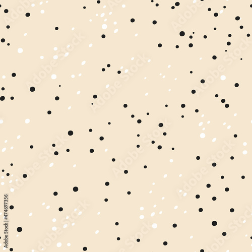 Abstract seamless pattern. Dots are located chaotically. Vector design for textiles and packaging