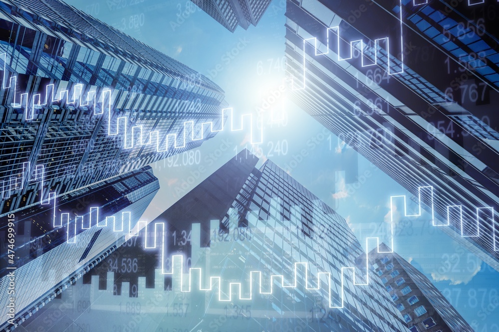 Fototapeta premium Smart city concept with growing digital graphs and diagram at abstract night city background.