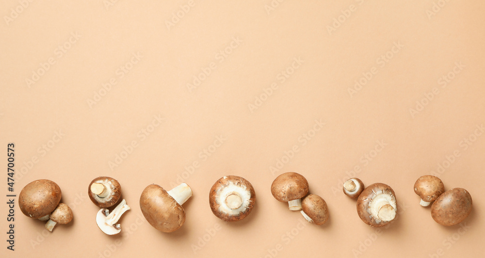 Concept of tasty food with champignon on beige Concept of tasty food with champignon on beige