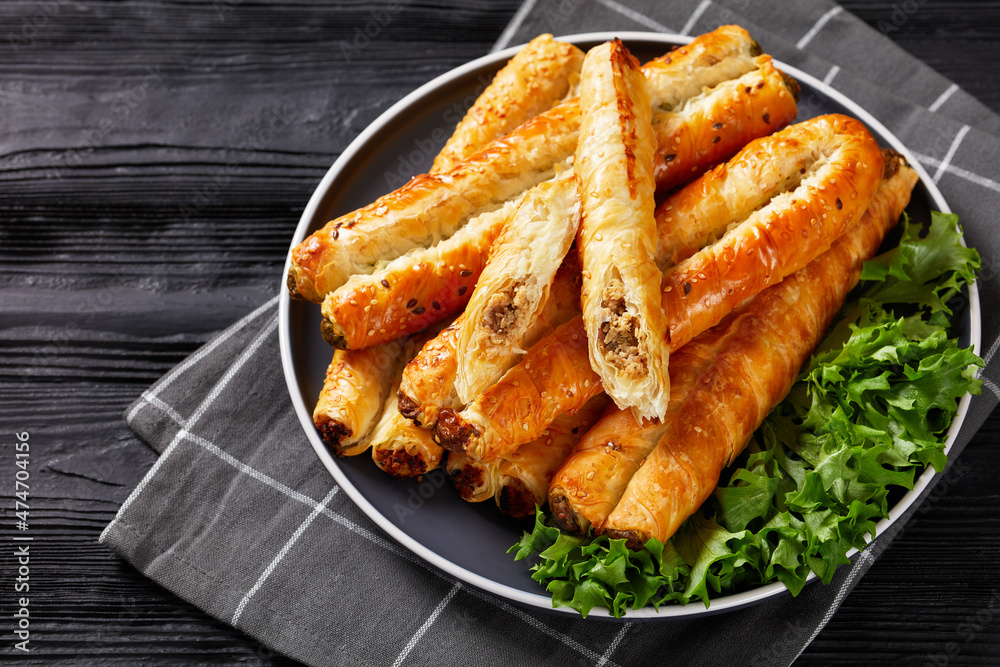 Rollini with chicken meat filling on a plate Rollini with chicken meat filling on a plate