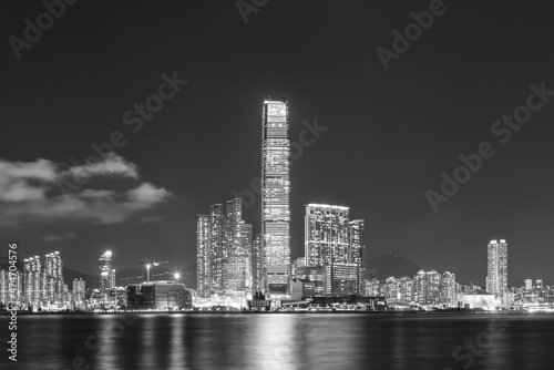 Panorama of skyline of Victoria harbor of Hong Kong city at night © leeyiutung