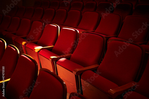 Photography Rows of red seats in a concert hall