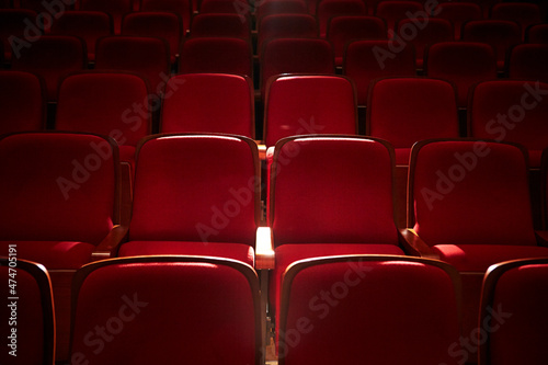 Rows of red seats in a concert hall