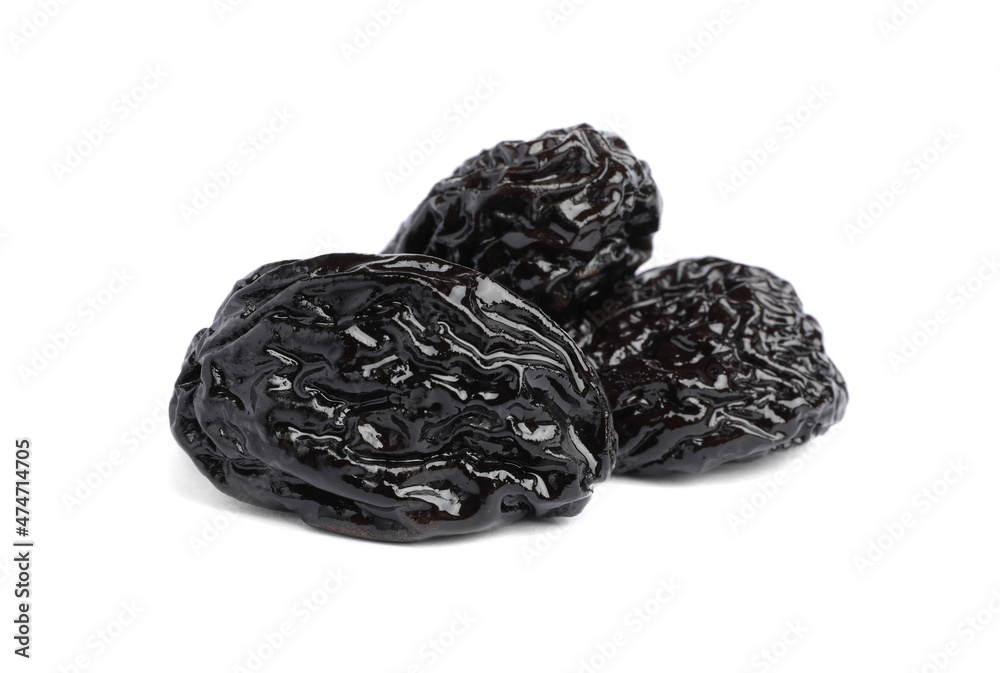 Sweet dried prunes on white background. Healthy snack Sweet dried prunes on white background. Healthy snack
