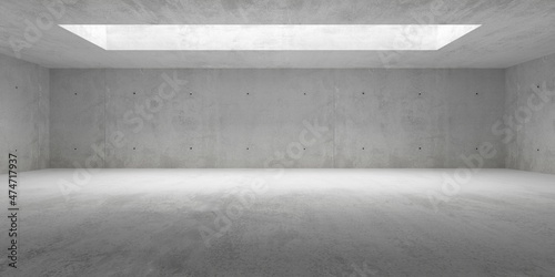 Empty modern abstract concrete room with light thru rectangular ceiling opening and rough floor - industrial interior background template