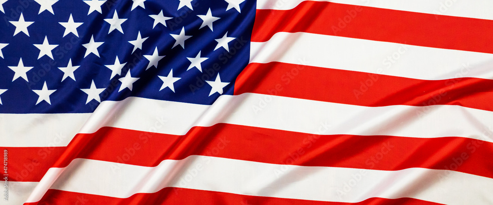 Obraz premium American wave flag for Memorial Day, 4th of July or Labour Day. USA flag background banner